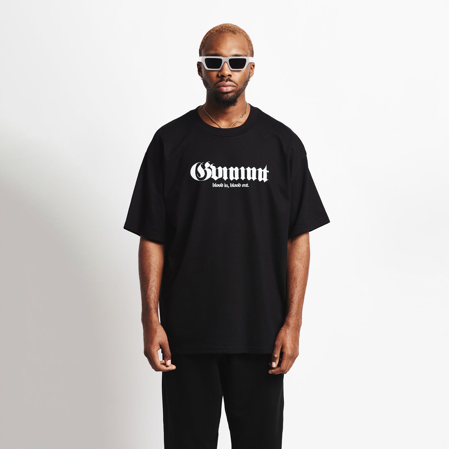 Blood In, Blood Out Tee - Black - GVNMNT Clothing Co', European streetwear.