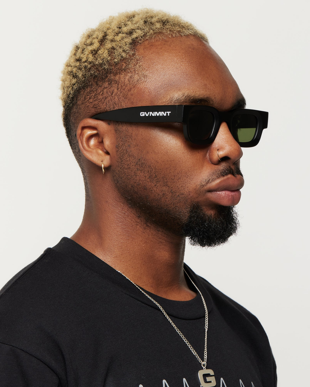 Conflict Sunglasses - Black / Emerald